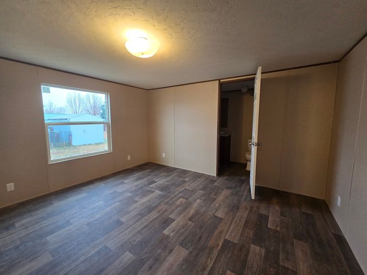 Spacious primary bedroom with an Primary bathroom