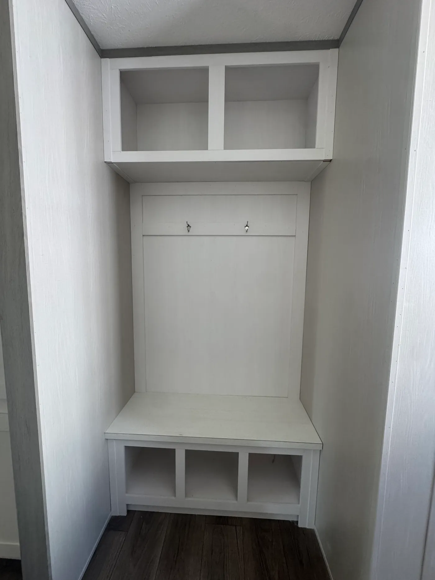 Utility bench seat with shoe storage and coat hooks