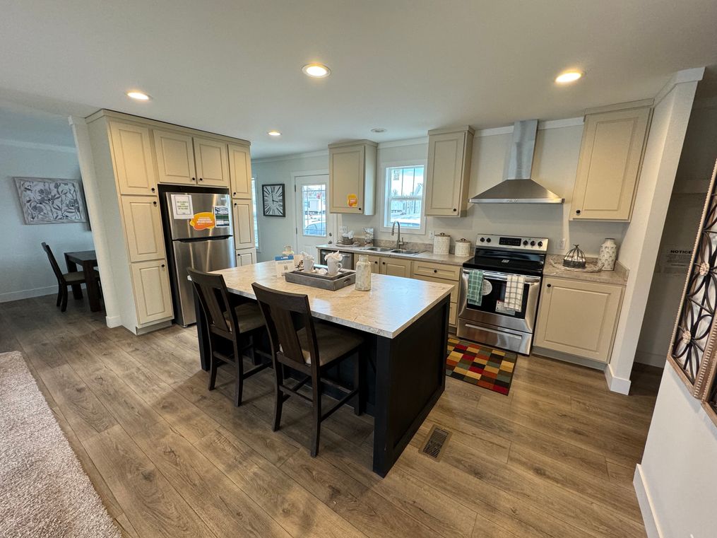 Spacious open Kitchen. Large Island dining, stainless appliances.