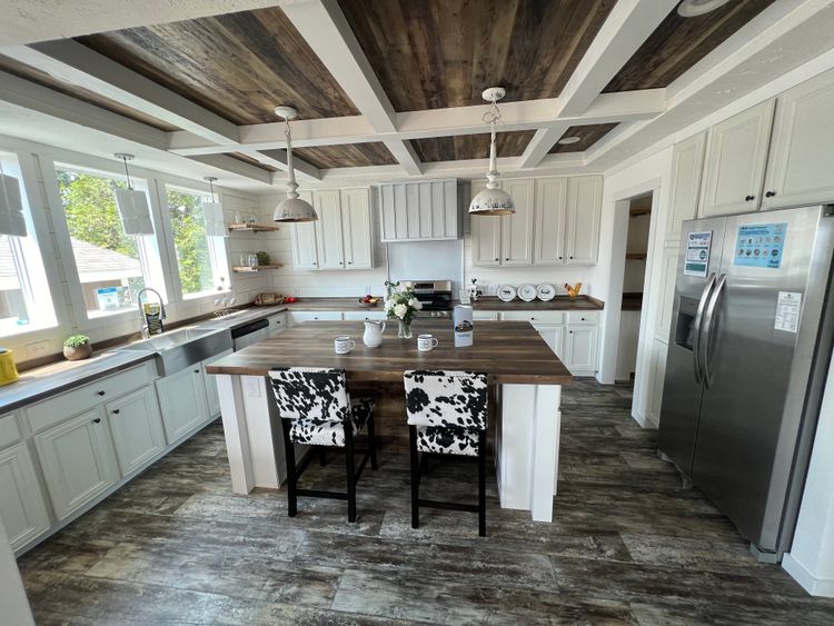 Beautiful open kitchen with plenty of cabinbets!