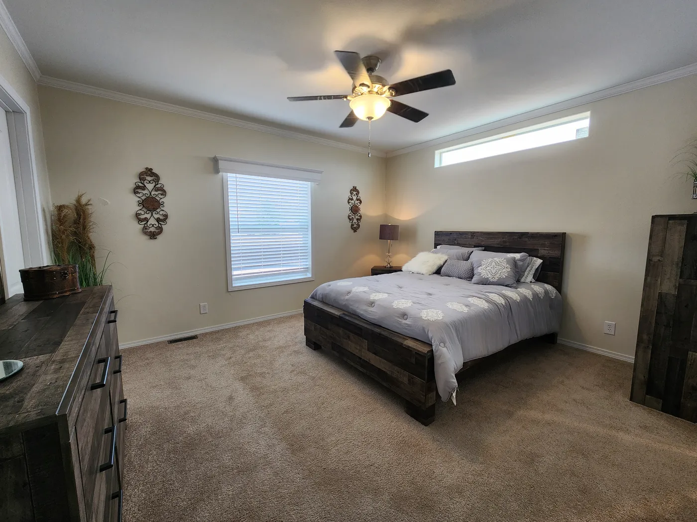 Primary bedroom with walk- in closet