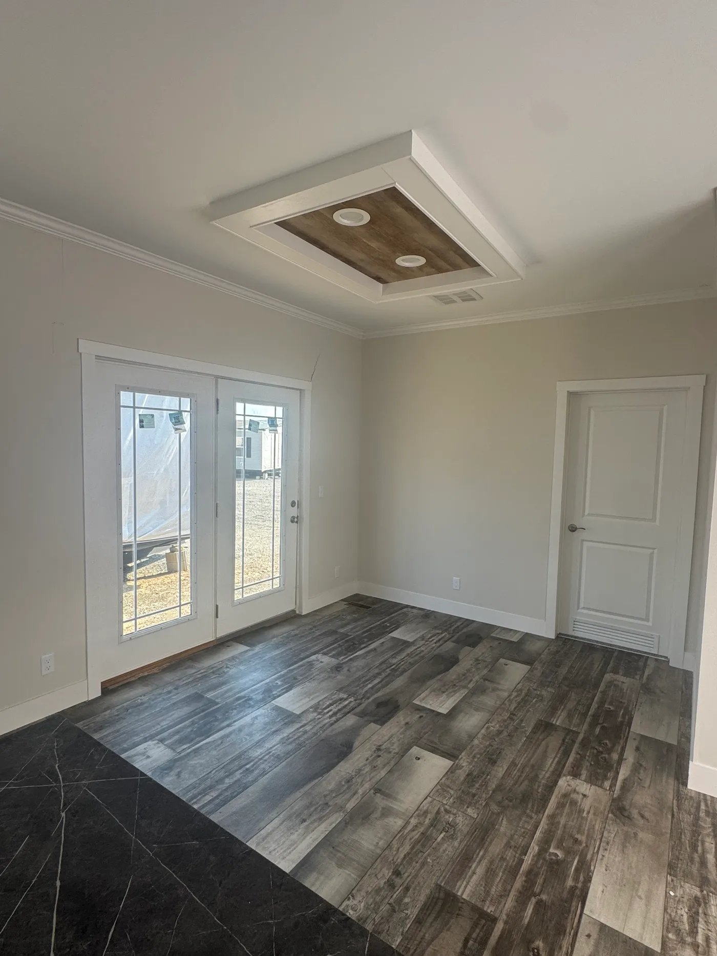 Dining room tray ceiling, Atrium door, and office door entry. 