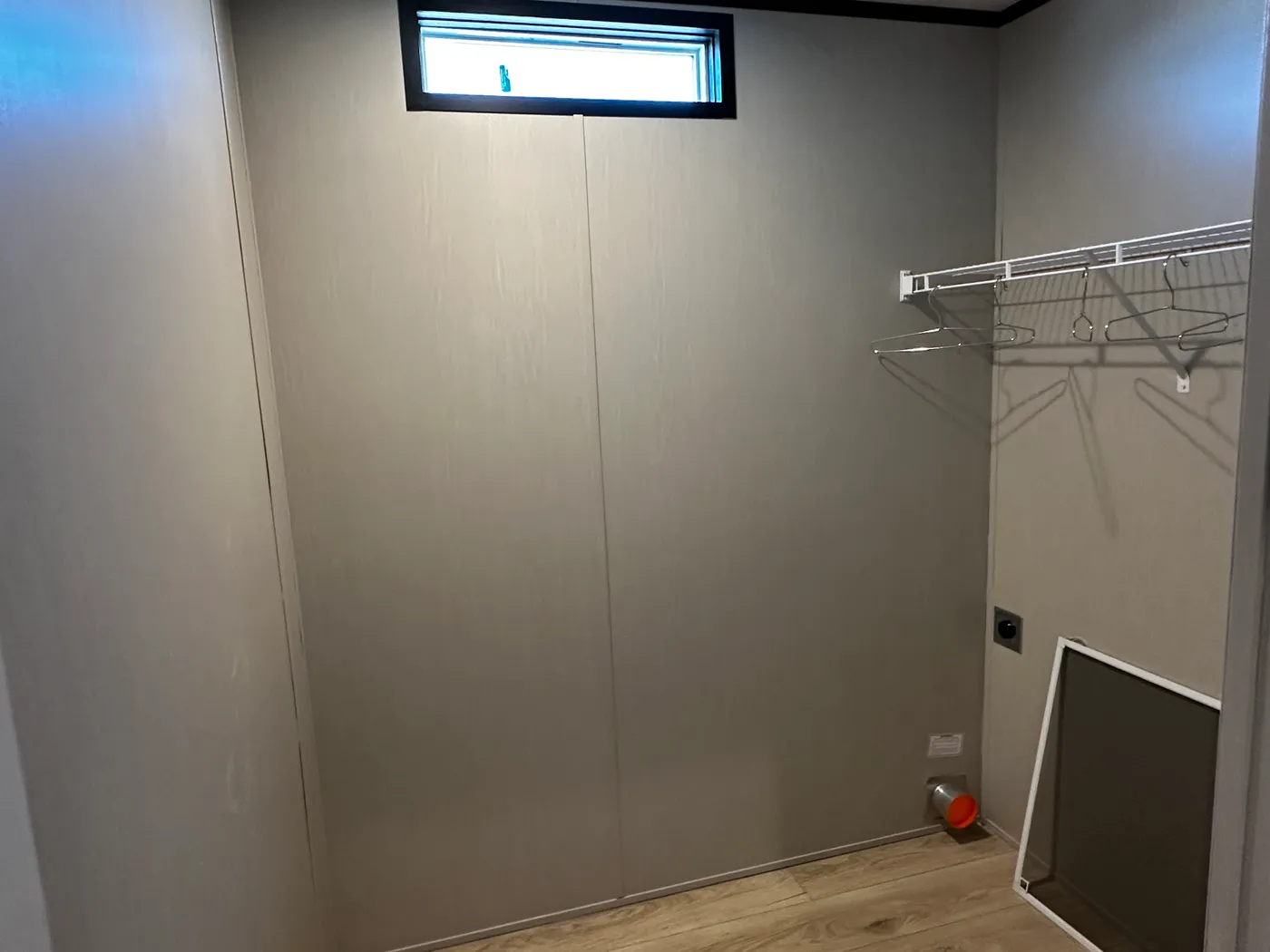 Beautiful 3 bedroom, 2 bathroom manufactured home featuring a modern charcoal interior and open-concept design. The stylish kitchen includes stainless steel appliances, a stainless steel farmhouse sink, and ample cabinet space. The spacious living room offers a built-in entertainment center with electric fireplace, perfect for relaxing or entertaining. The private primary suite features a tiled low-profile walk-in shower, a large garden soaking tub, and generous storage. This home combines affor