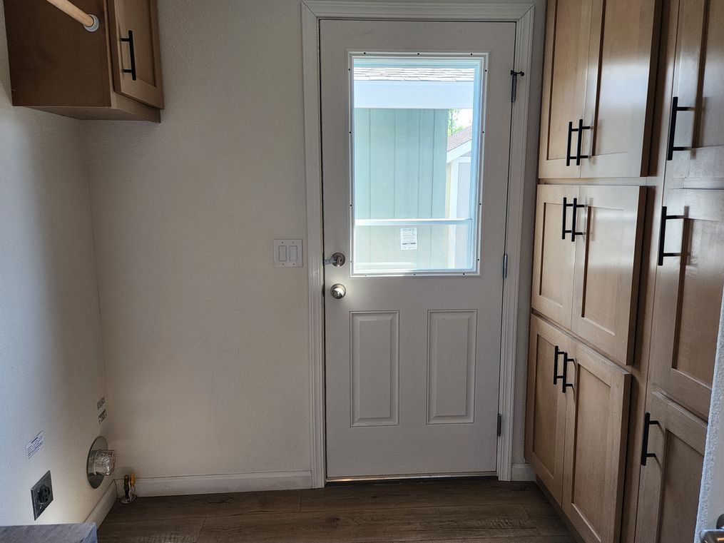 Large linen cabinets in utility room