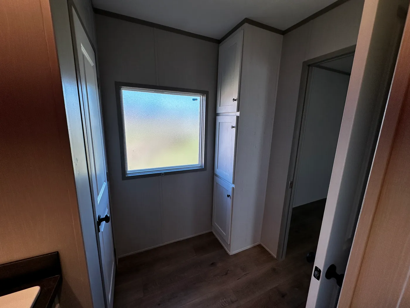 Discover this luxury porch model manufactured home featuring 2 bedrooms, 2 bathrooms, and high-end finishes designed for comfort and style. This modern manufactured home offers an open floor plan, stainless steel appliances, and a huge kitchen island perfect for entertaining. The spacious suite includes a walk-in closet and a large tiled low-profile walk-in shower for a spa-like feel. Built for durability and long-term value, this home features SmartPanel siding with a 50-year warranty, a 25-yea