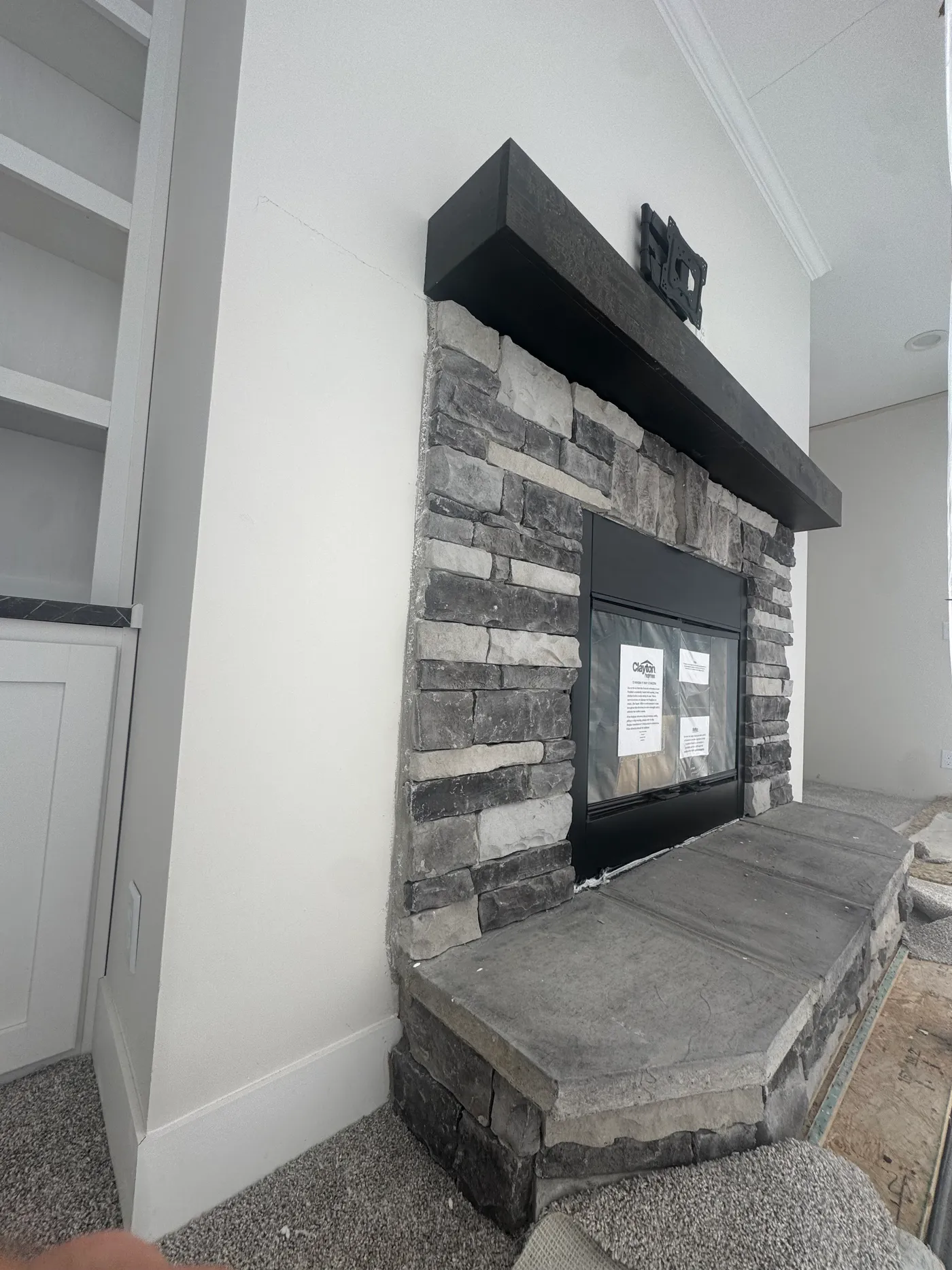 Wood Burning Fireplace with Bookcases. 