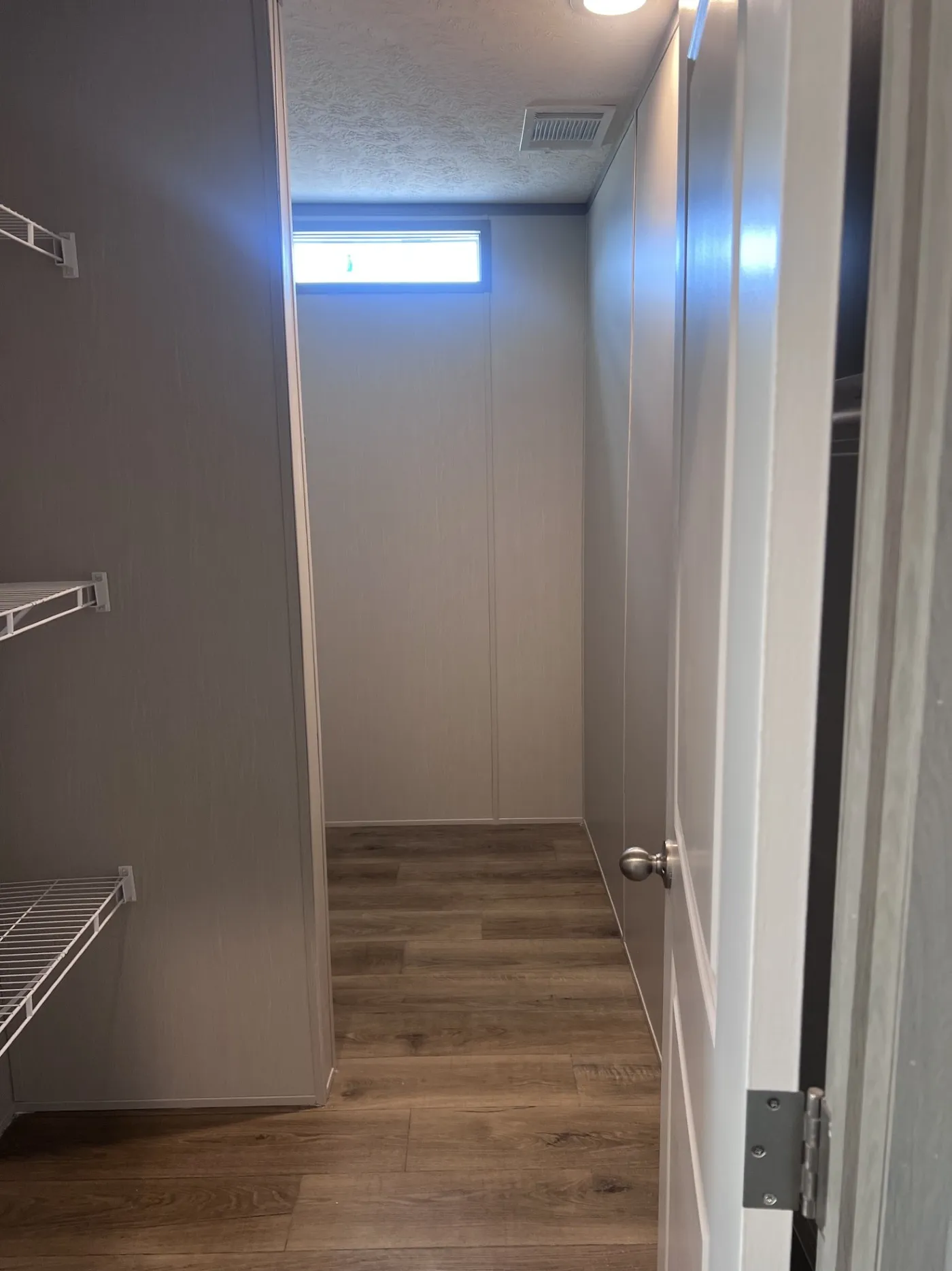 large utility room closed off so nobody has to ever walk through your laundry area... sweet