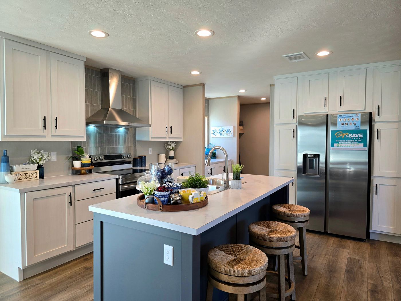 STOCK PHOTO - home for sale is same colors and does include appliances as shown but does not include furniture or decor.