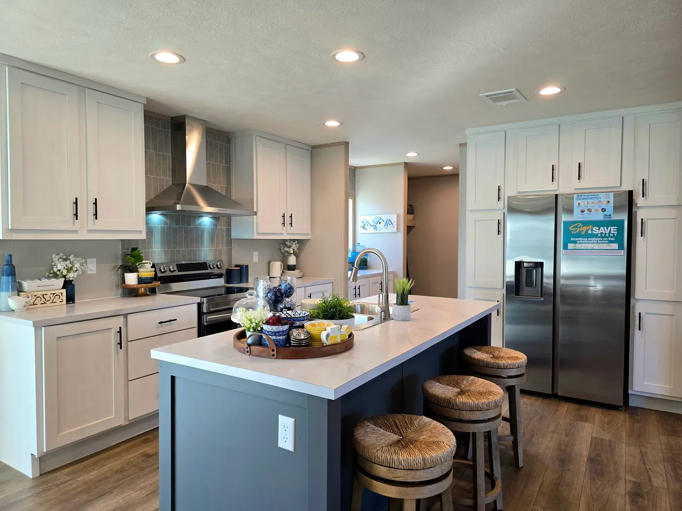 STOCK PHOTO - home for sale is same colors and does include appliances as shown but does not include furniture or decor.