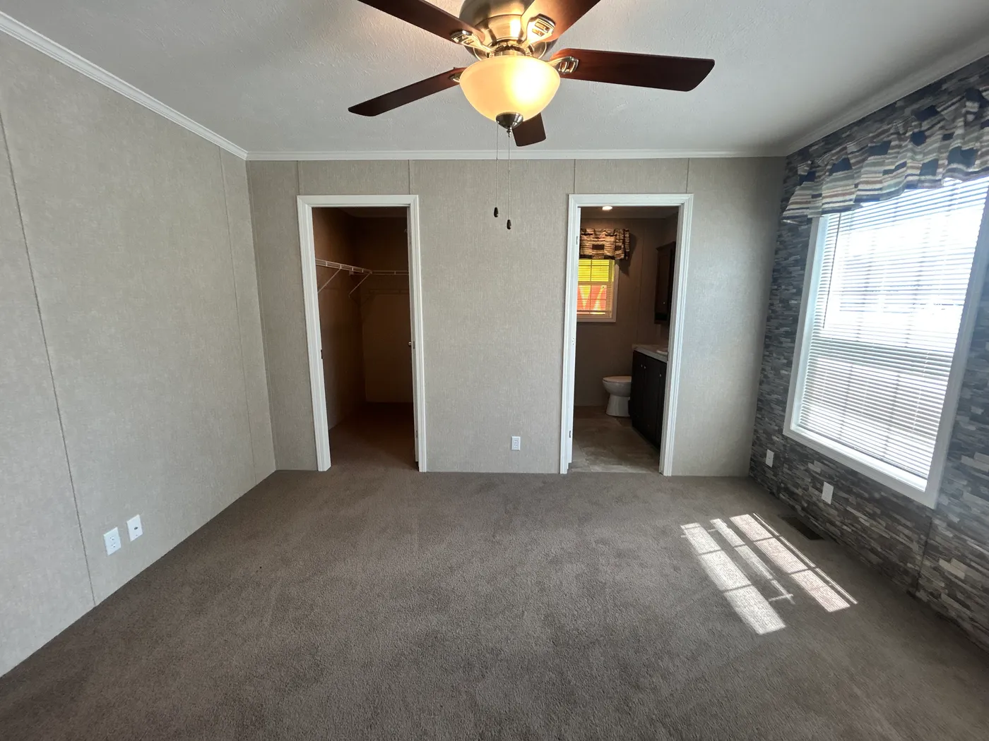 One last view featuring the accent wall in the main bedroom. 