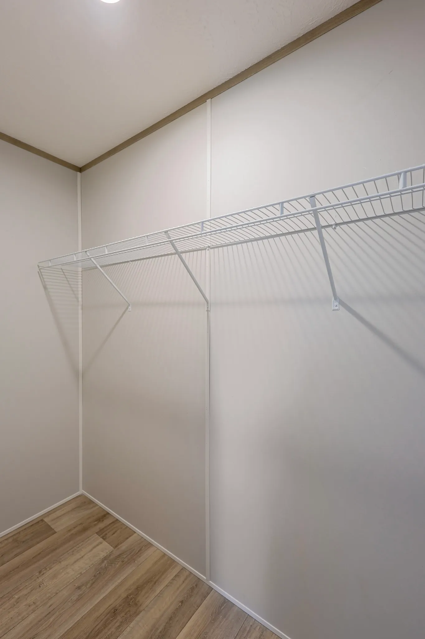 primary bedroom walk-in closet