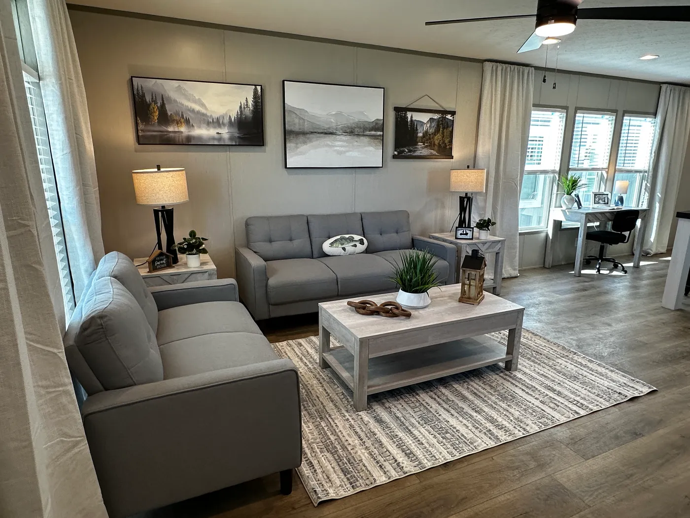 Discover this luxury porch model manufactured home featuring 2 bedrooms, 2 bathrooms, and high-end finishes designed for comfort and style. This modern manufactured home offers an open floor plan, stainless steel appliances, and a huge kitchen island perfect for entertaining. The spacious suite includes a walk-in closet and a large tiled low-profile walk-in shower for a spa-like feel. Built for durability and long-term value, this home features SmartPanel siding with a 50-year warranty, a 25-yea