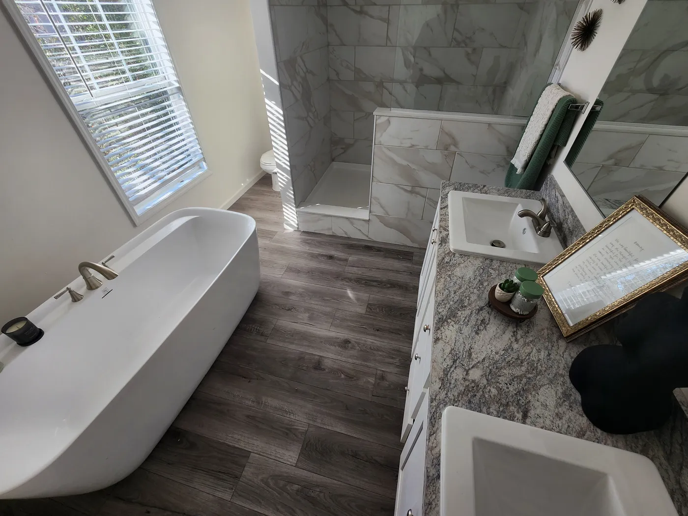 Featuring glamour bath option with freestanding soaking tub and ceramic walk-in shower