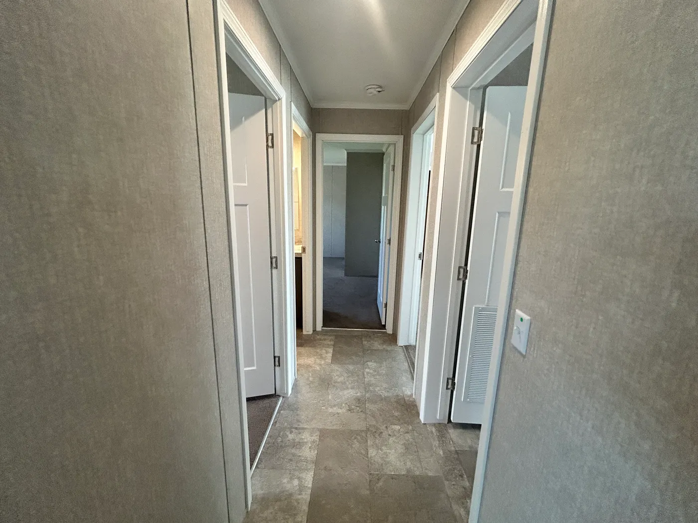 Hallway leading away from the family room. 