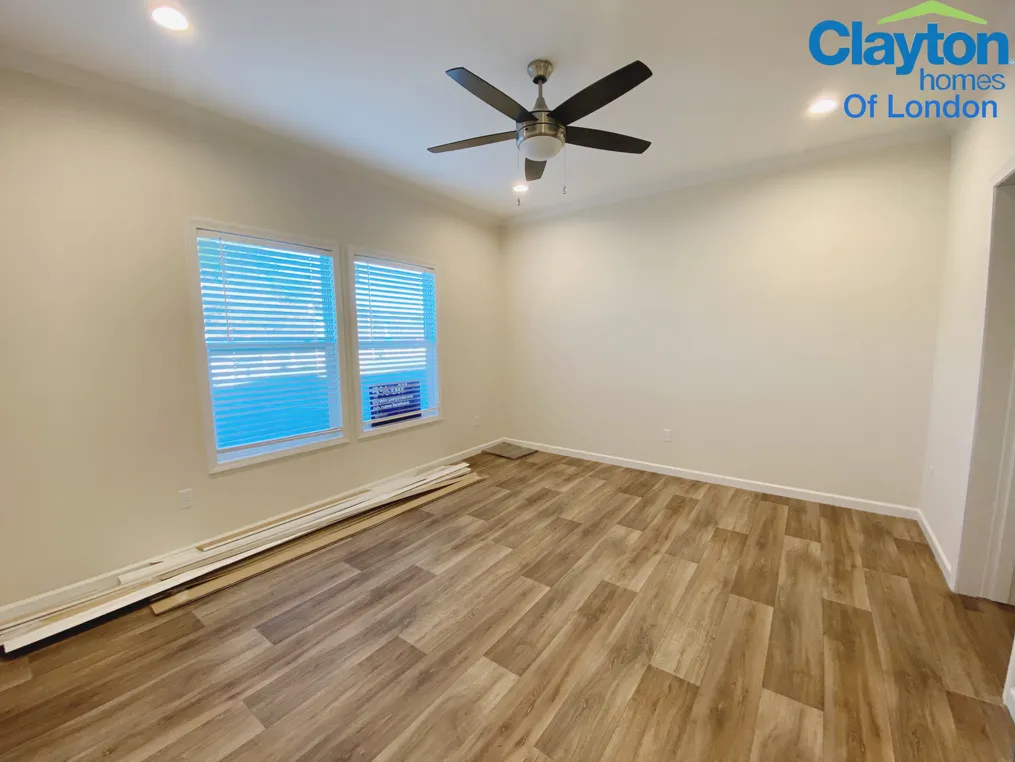 Primary Bedroom. Ceiling Fan. Private entry into bathroom.