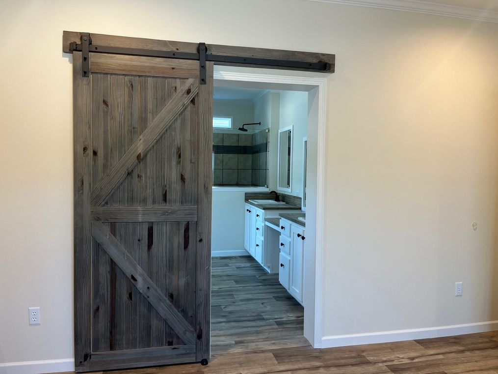 Barn Door to the Primary Bathroom 