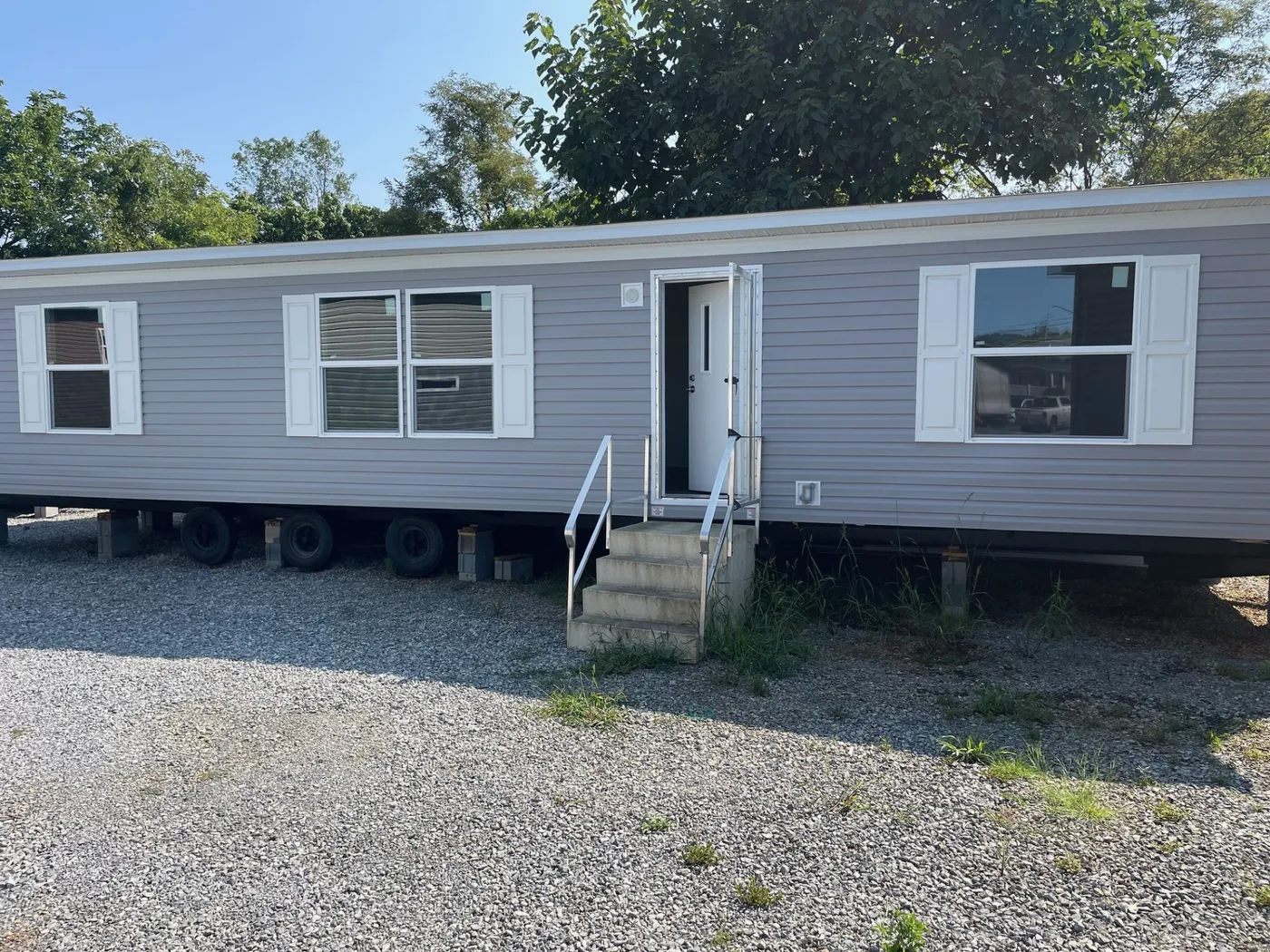 Beautiful 3br/2ba, open concept home for under $100k with delivery, set up, heat pump, and footers! Tax, site prep, decks, septic system, water tie in, power tie in, skirting and steps not included