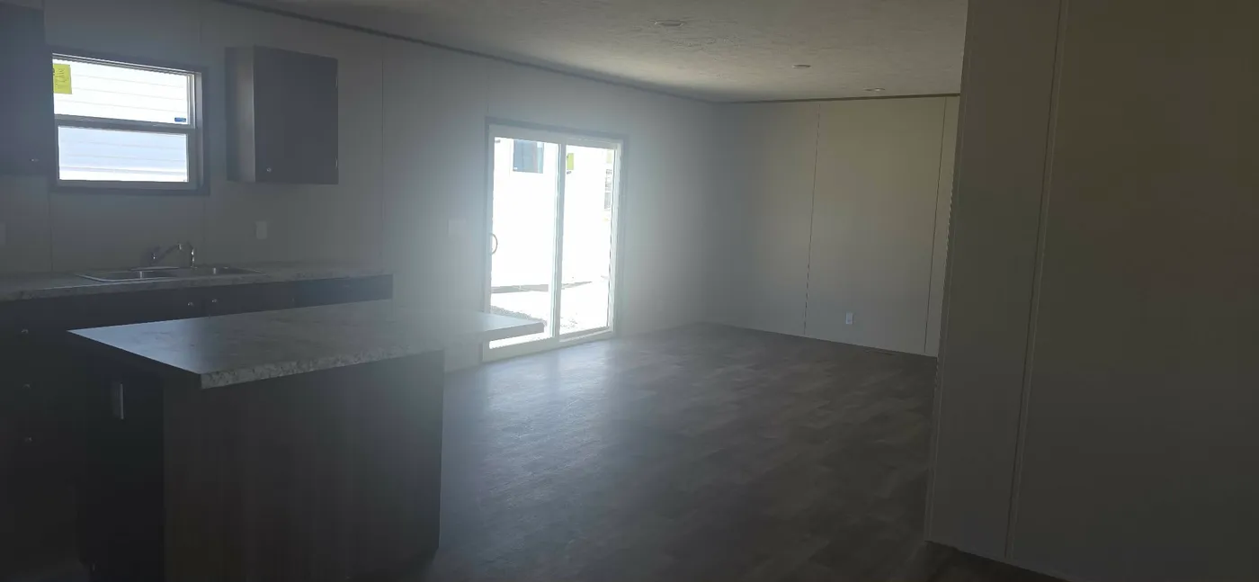 open floor plan with living and den