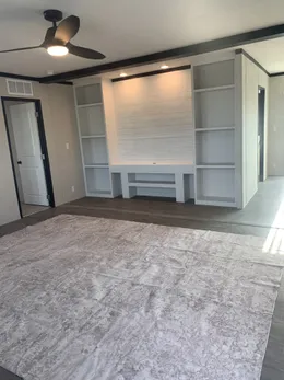 Open concept Living Room with Entertainment accent wall.