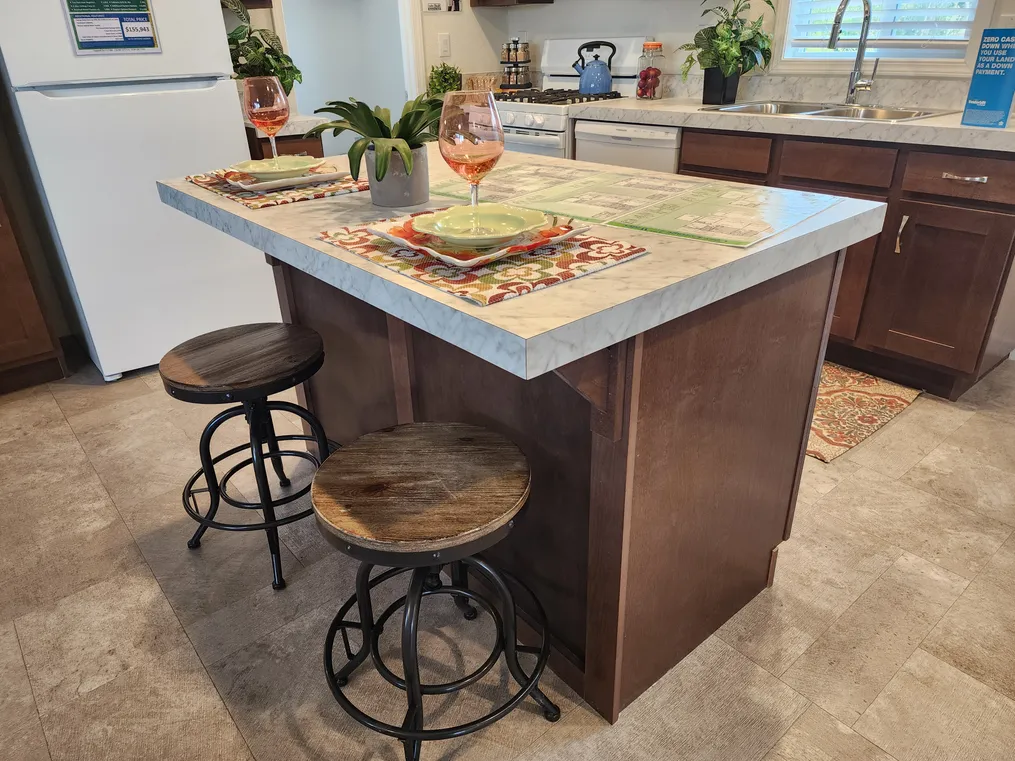 Island kitchen with sit in snack bar.