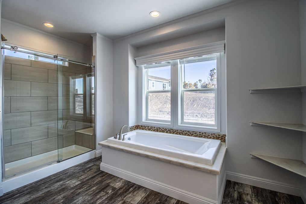 Master bath with soaking tub and huge shower. 