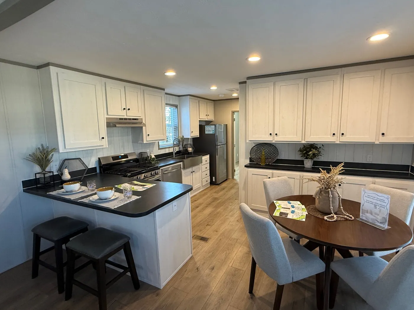 Large kitchen and dining area, including a snack bar and more built ins