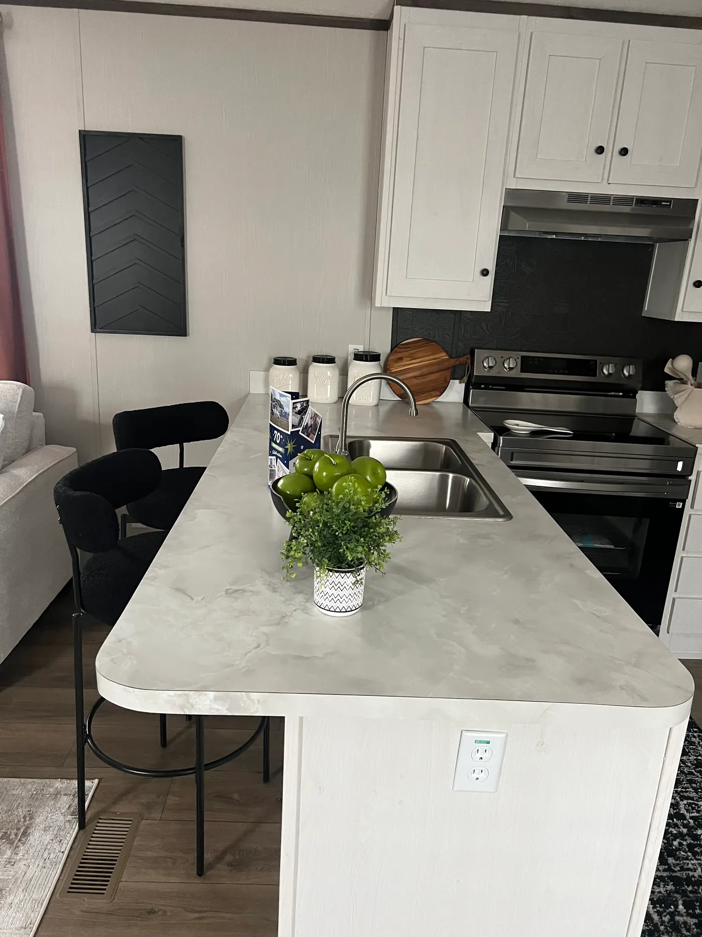 Beautiful manufactured tiny home living room and kitchen. Best deals and prices on affordable, quality, Clayton Built manufactured home in texas.