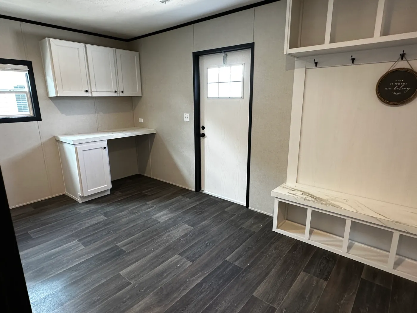 Spacious 4 bedroom 2 bath double wide manufactured home with massive square footage and modern design. Features an open floor plan with a large living room and separate den, perfect for entertaining or family living. The master suite offers a relaxing garden soaking tub, tiled-in walk-in shower, and plenty of space. Enjoy a cozy built-in fireplace, stylish finishes, and energy-efficient construction. This affordable mobile home is ideal for families seeking space, comfort, and value.