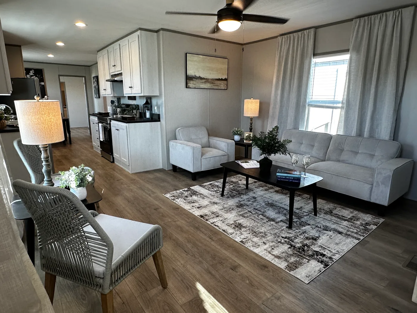 Affordable luxury meets modern comfort in this 3 bedroom, 2 bathroom manufactured home designed for spacious living and energy efficiency. The open-concept layout features a stylish kitchen with stainless steel appliances and a large walk-in pantry for extra storage. The private primary suite includes a generous walk-in closet and a relaxing retreat feel. Enjoy improved comfort with ceiling air vents for better airflow and temperature control throughout the home. This energy-efficient home offer