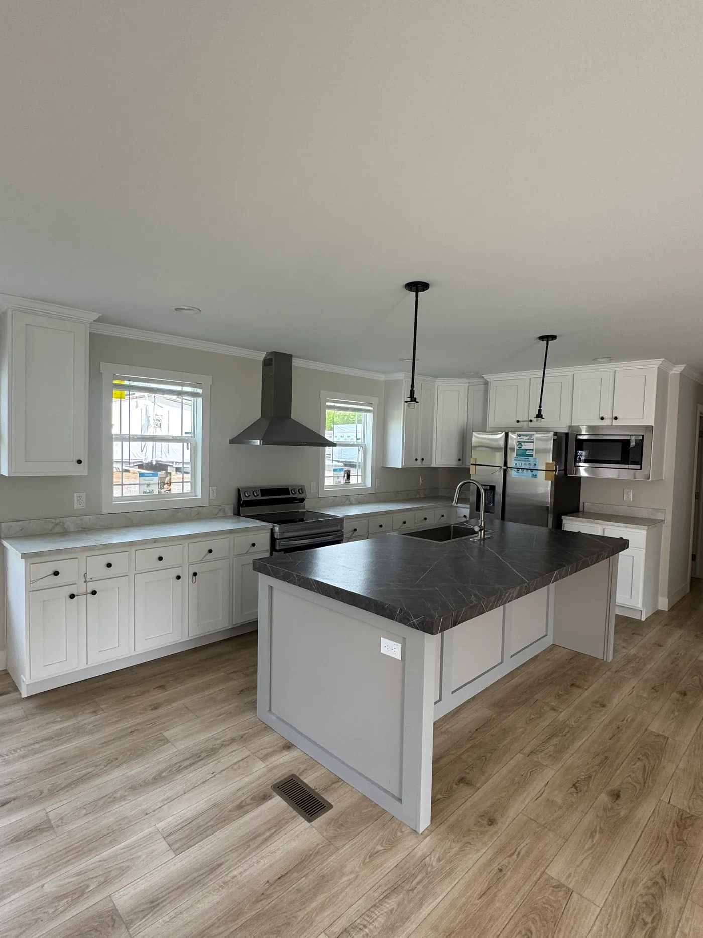 Kitchen Layout. Wood Cabinets. Built in microwave. 