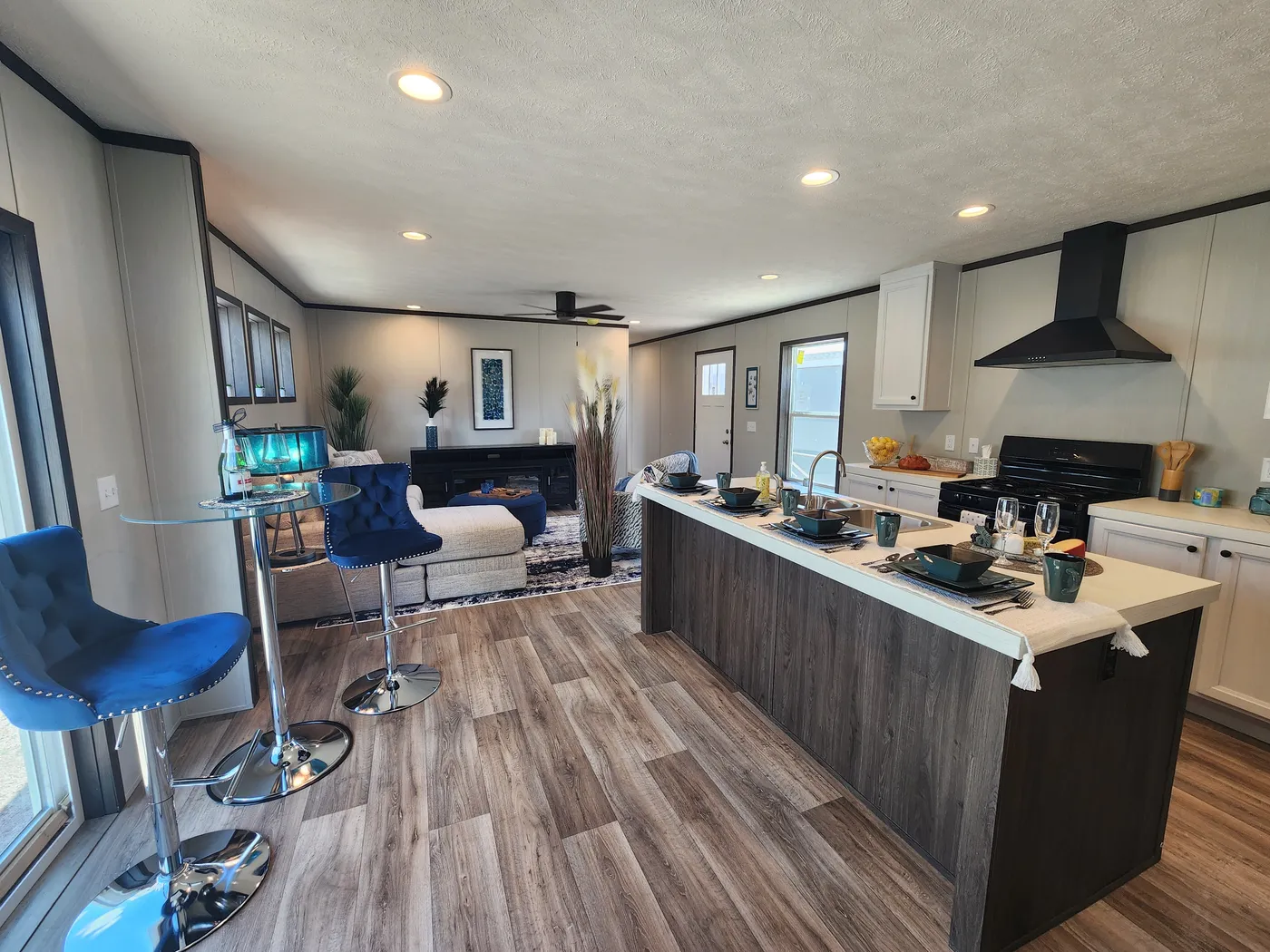 Open concept living room, kitchen and dining room