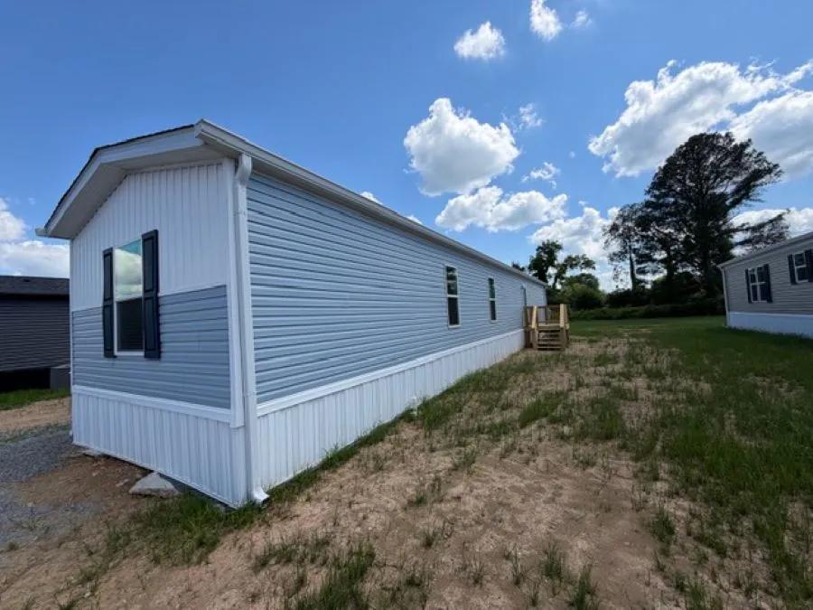 Rear of home with Deck