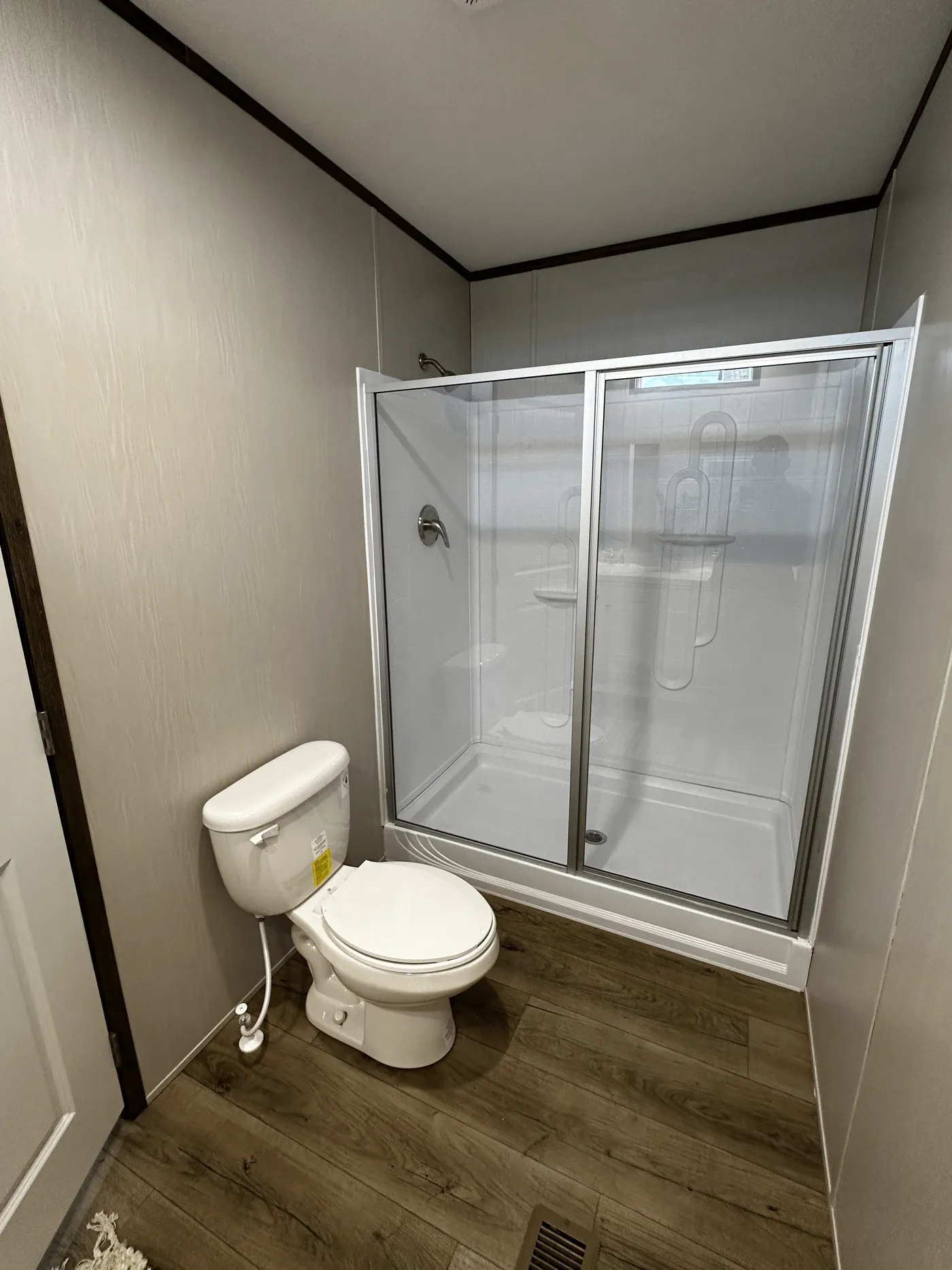 affordable manufactured home, singlewide for sale, stainless steel appliances mobile home, walk-in shower mobile home, walk-in closet master bedroom, energy-efficient mobile home, natural light mobile home, modern manufactured home, budget-friendly housing, factory-built home for sale.