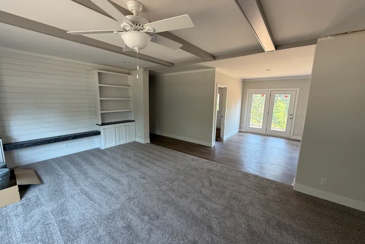 Living room with built in entertainment center and shelves!