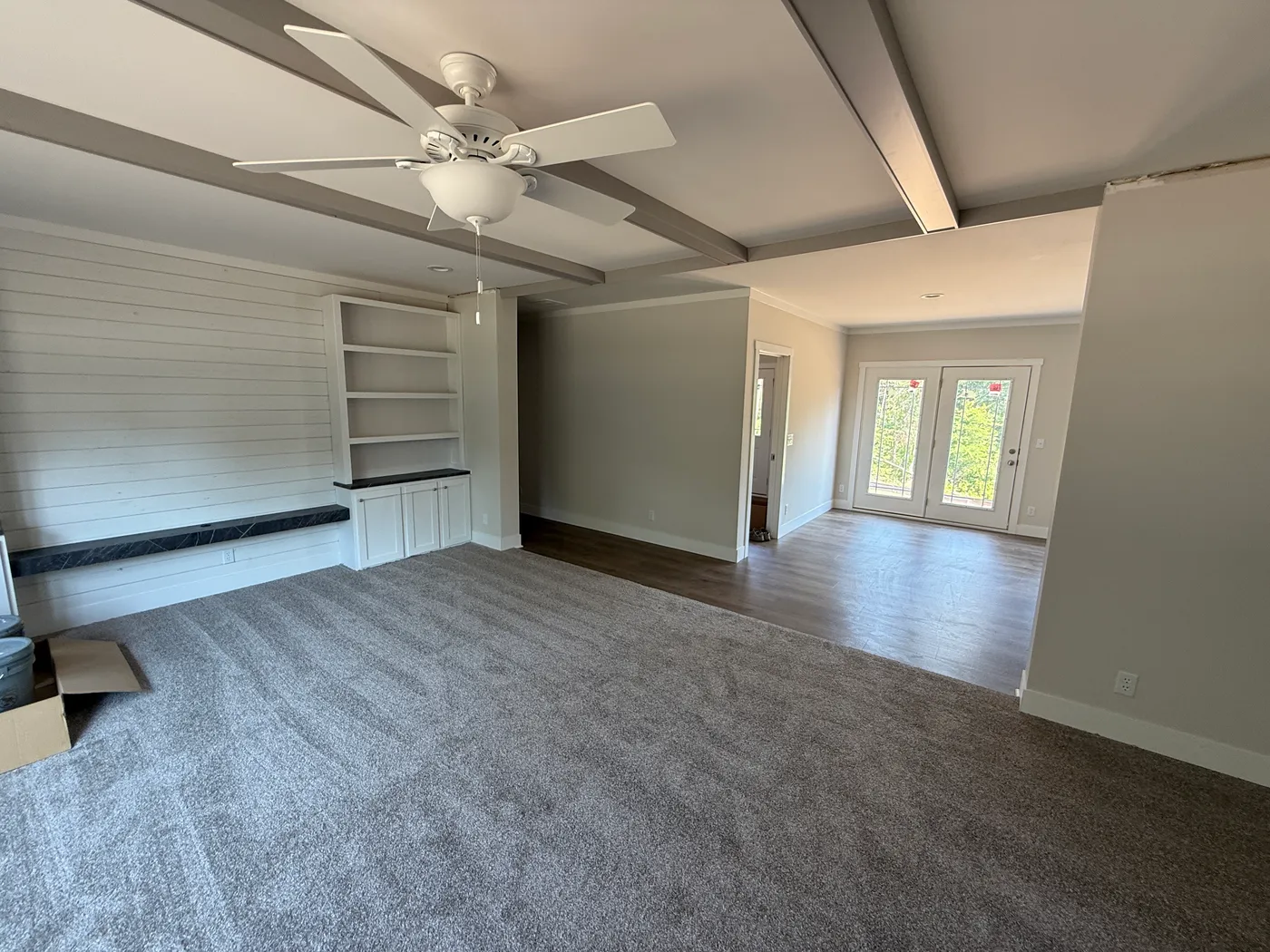 Living room with built in entertainment center and shelves!