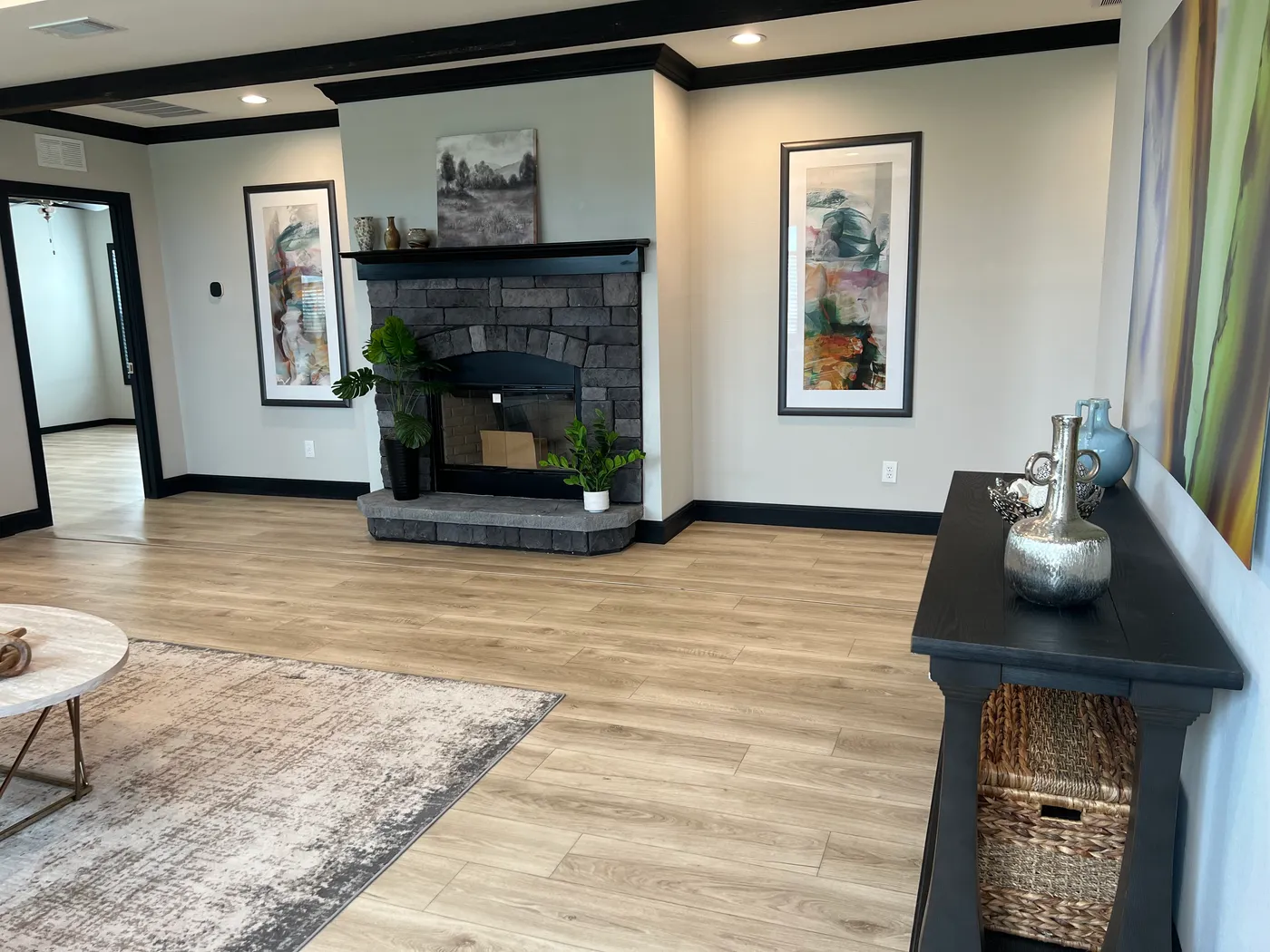 Beautiful tape and texture manufactured home living room with 9 foot tray ceiling . Best deals and prices on affordable, quality, Clayton Built manufactured home in texas.