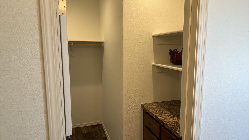 Spacious walk in closet in the master.