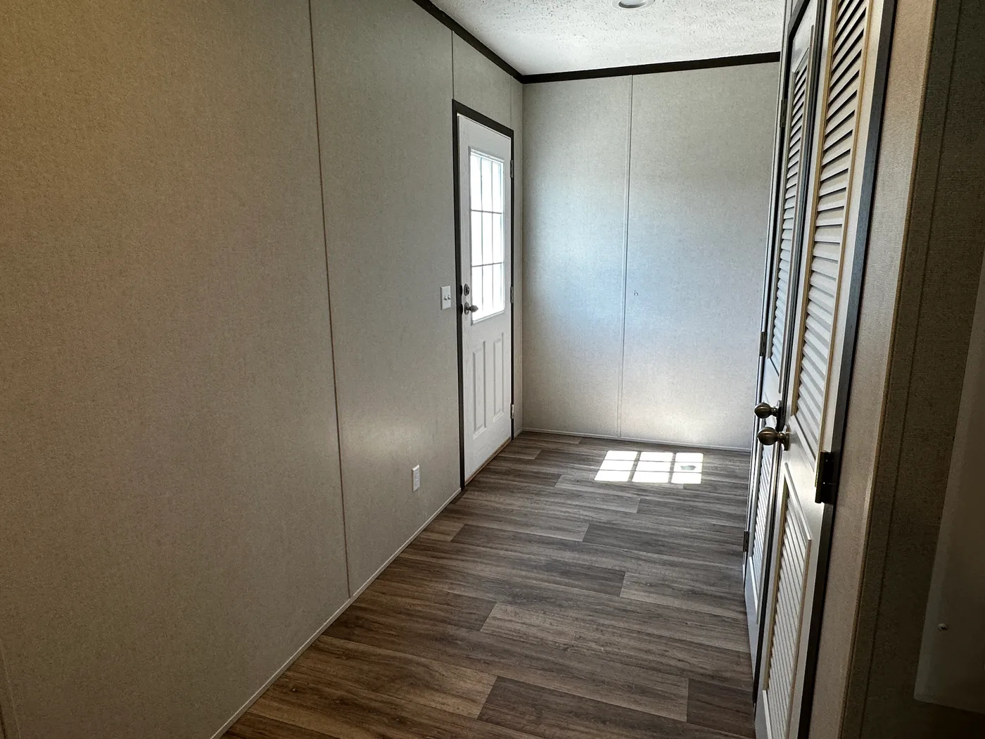 extra wide doublewide mobile home, 32x52 manufactured home, SmartPanel siding mobile home, open floorplan manufactured home, energy-efficient doublewide, walk-in shower mobile home, walk-in closet master bedroom, spacious manufactured home for sale.
