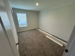 Spacious room with walk in closet.