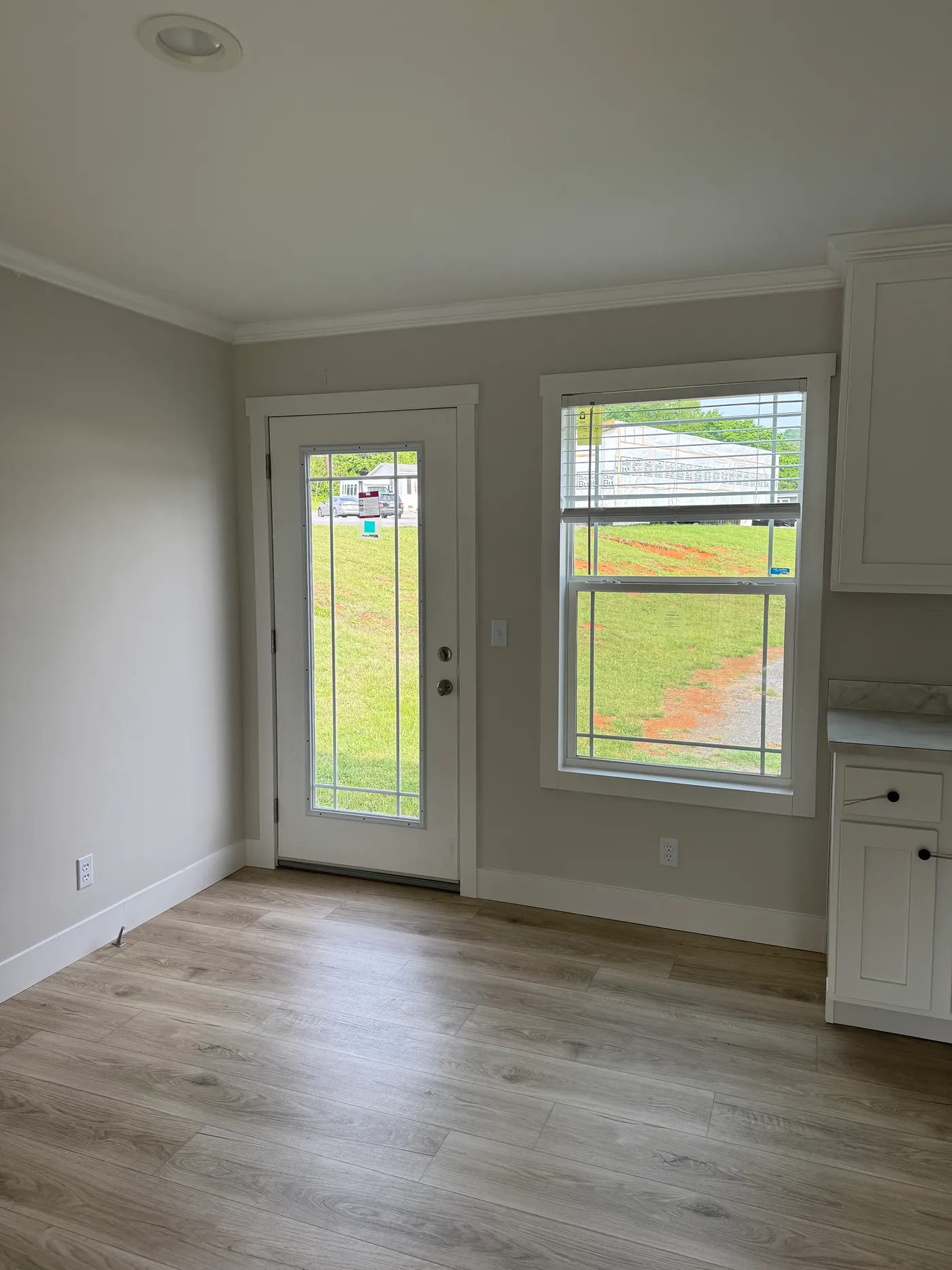 Dining room with rear door. 