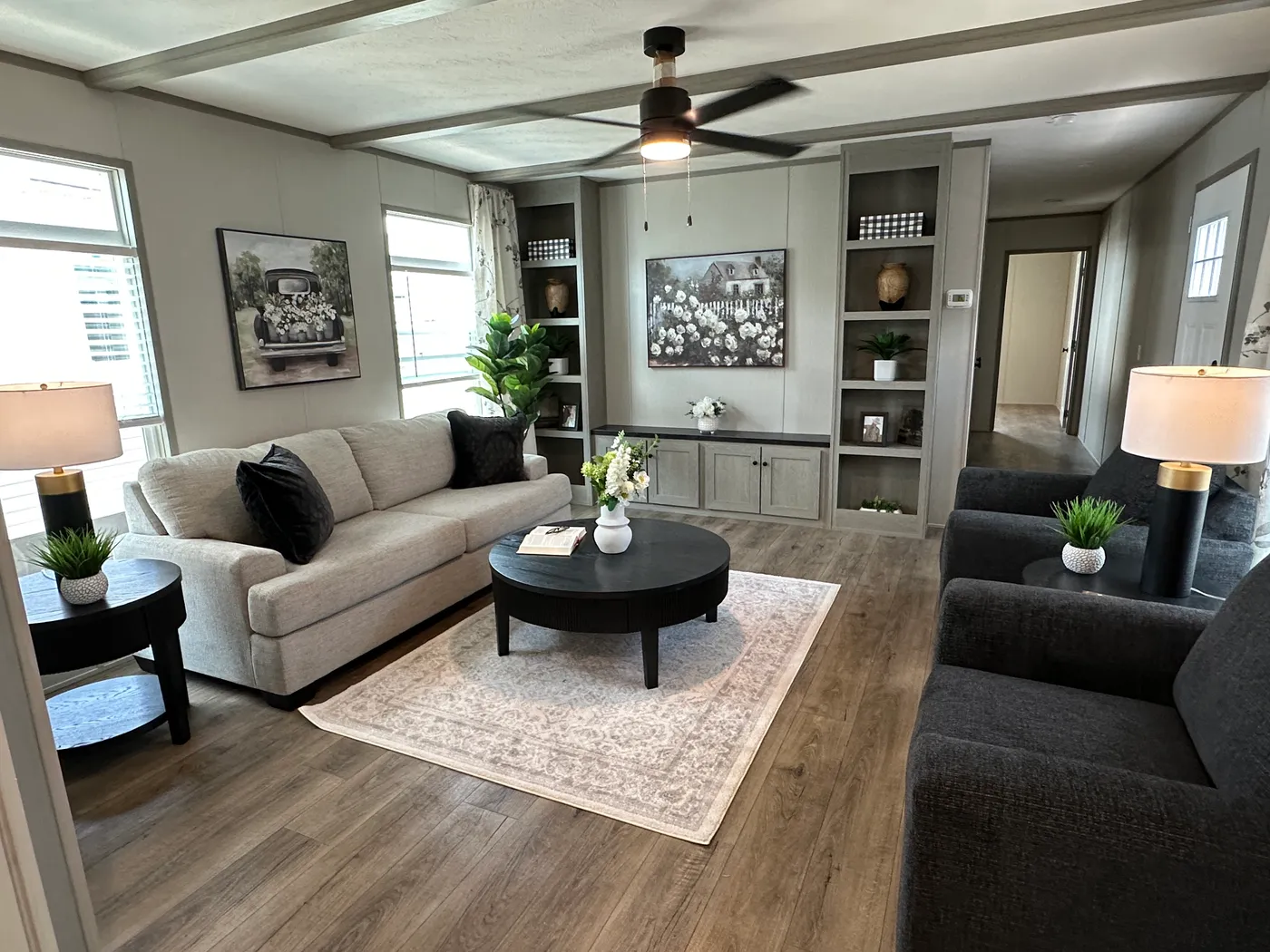 Introducing The Harvest, a beautiful 3 bedroom, 2 bathroom manufactured home with 1,216 sq. ft. of comfortable living space. This home is packed with popular upgrades, including a stainless steel farmhouse sink, a spacious kitchen design, built-in entertainment system, and upflow vents for added comfort and better furniture placement.

The private primary suite features a large garden soaking tub and separate walk-in shower, giving you the perfect place to relax after a long day. On the outsid