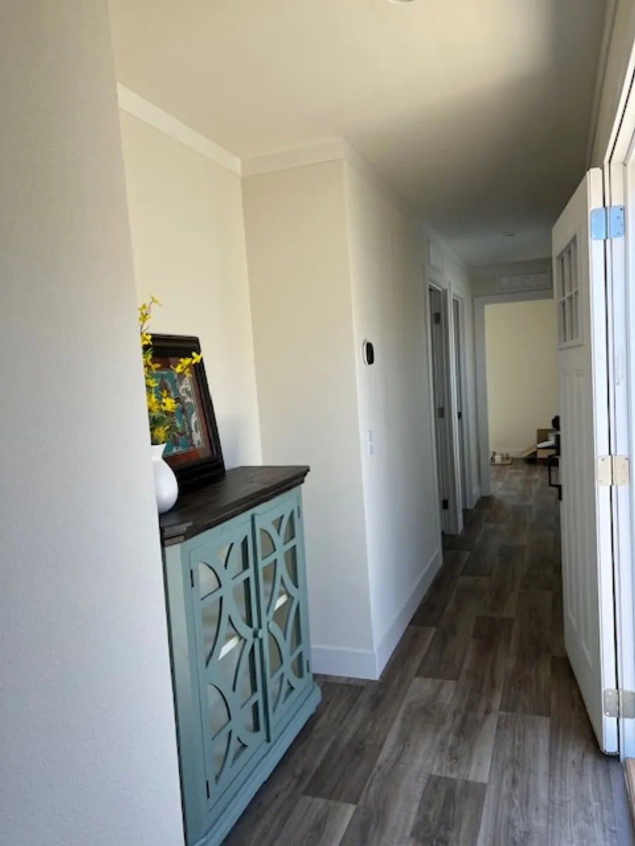 Another view of this beautiful Foyer and hall way in this single wide
