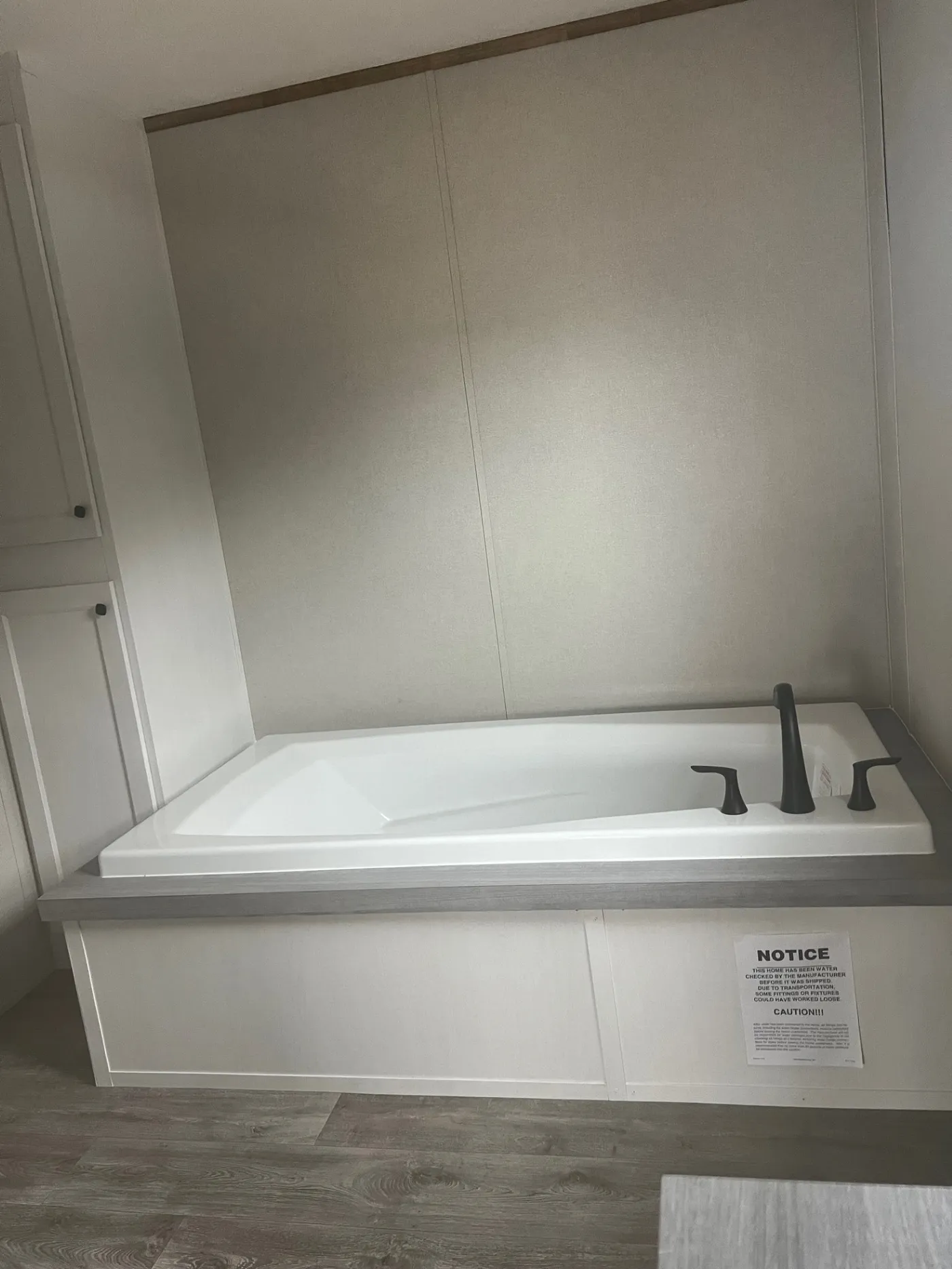 Sweet Retreat Soaker Tub and Linen Cabinets!