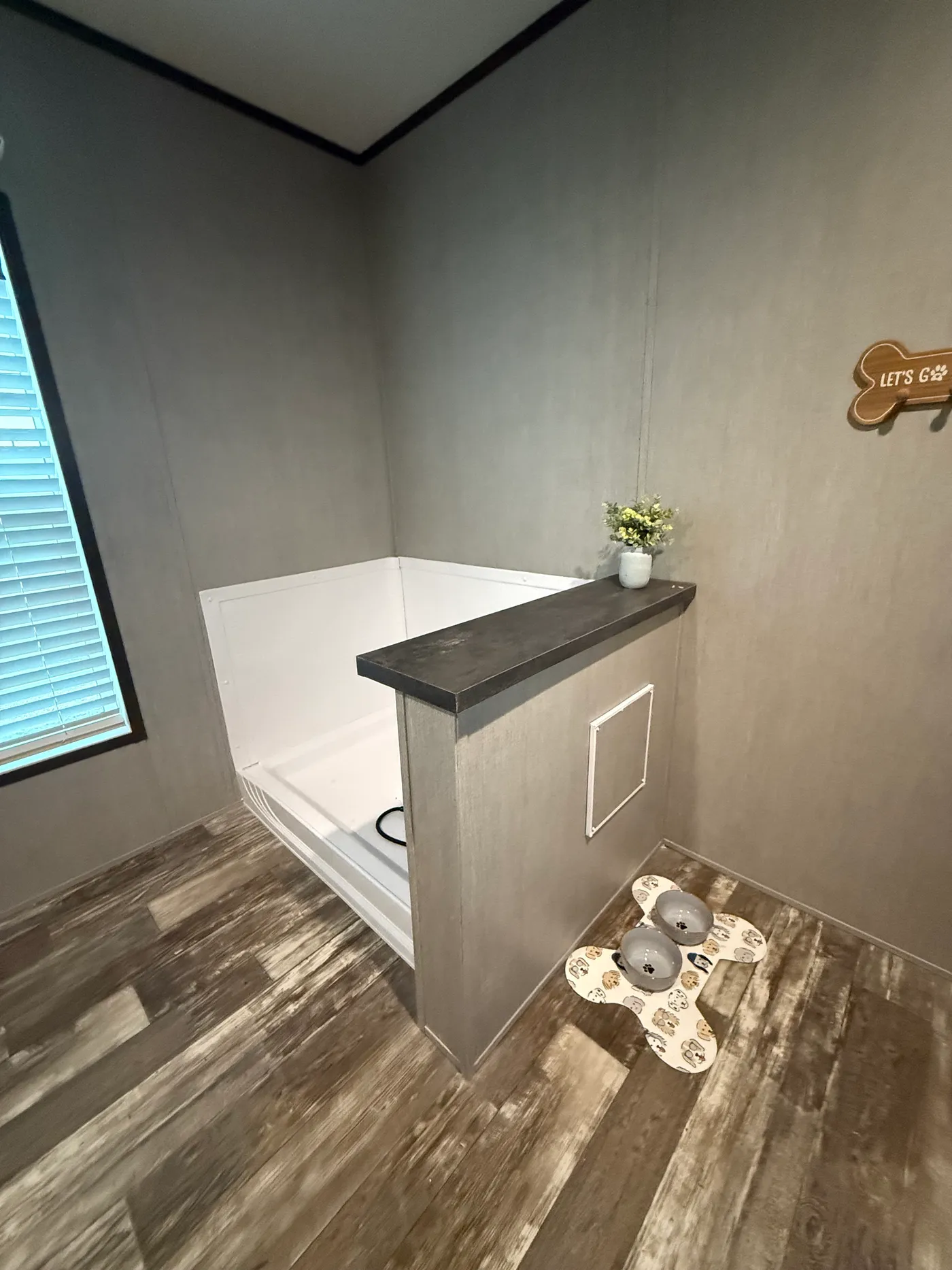 Built-in pet wash station for easy cleanup.