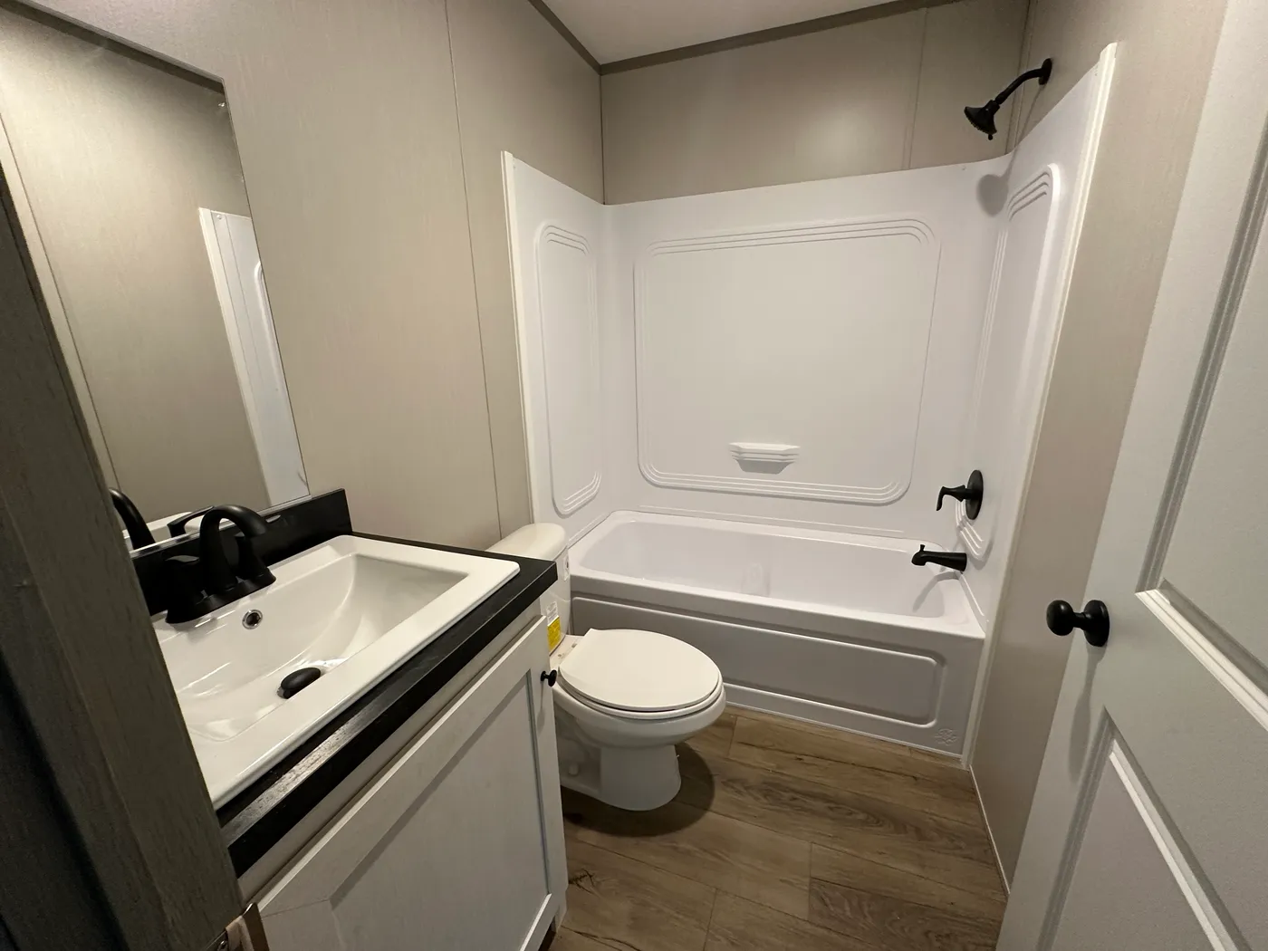 Introducing The Harvest, a beautiful 3 bedroom, 2 bathroom manufactured home with 1,216 sq. ft. of comfortable living space. This home is packed with popular upgrades, including a stainless steel farmhouse sink, a spacious kitchen design, built-in entertainment system, and upflow vents for added comfort and better furniture placement.

The private primary suite features a large garden soaking tub and separate walk-in shower, giving you the perfect place to relax after a long day. On the outsid
