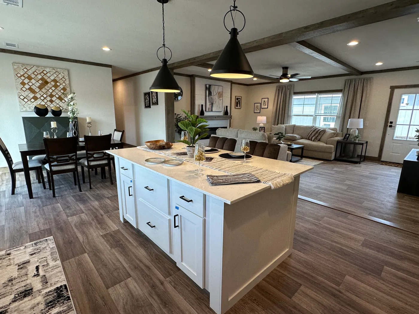 Discover The Summit, a stunning luxury doublewide manufactured home at Clayton Homes of Alvin, Texas! Designed for modern living, this beautiful home features a spacious open-concept floor plan, elegant interior finishes, and an impressive gourmet kitchen with a massive center island, stainless steel appliances, and abundant cabinet space. Enjoy generous living areas, spacious bedrooms, walk-in closets, and a luxurious primary suite designed for comfort and relaxation. Combining modern farmhouse