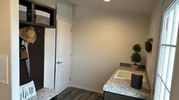 Utility room with utility sink