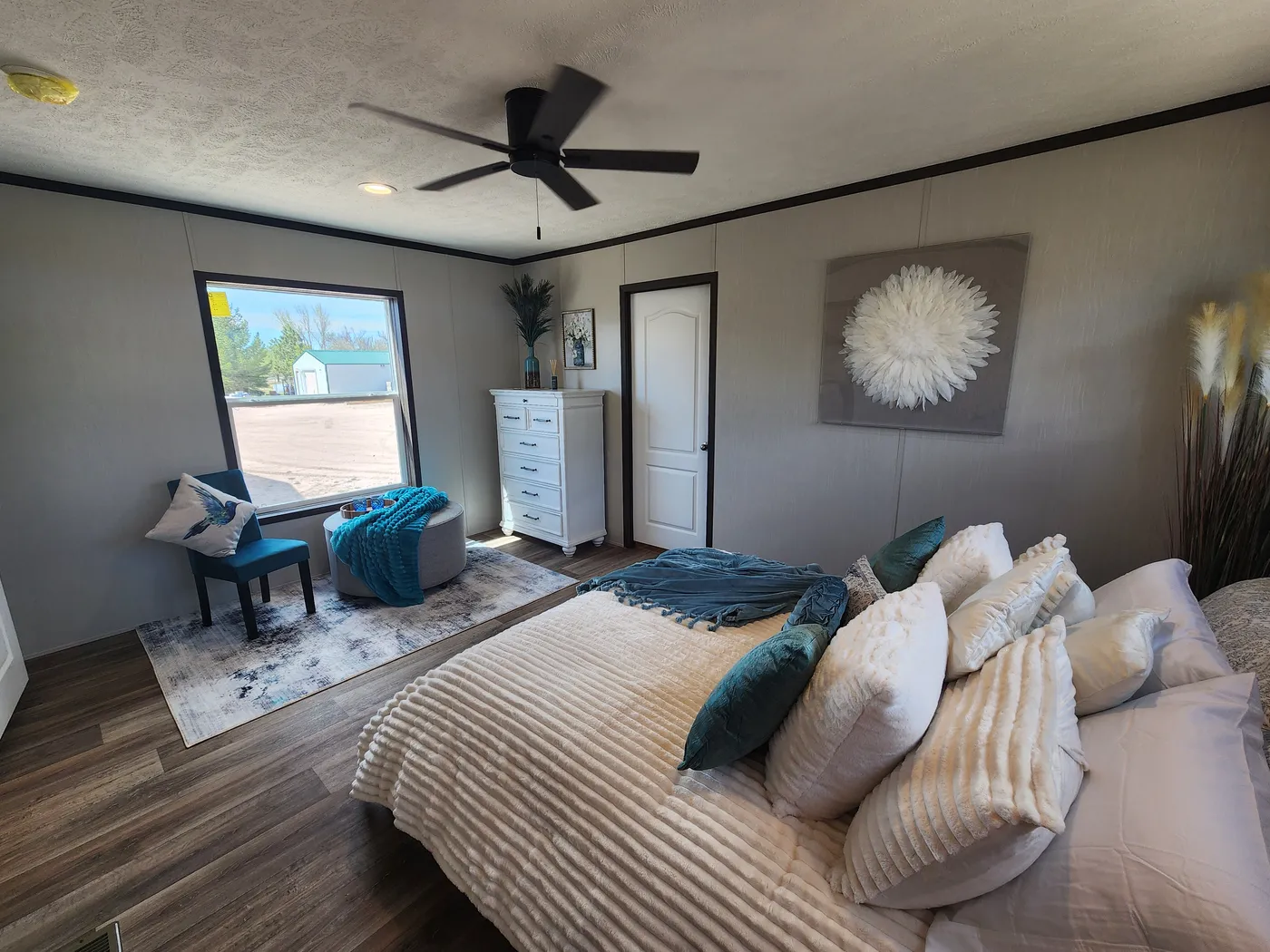 Primary bedroom with lots of natural light