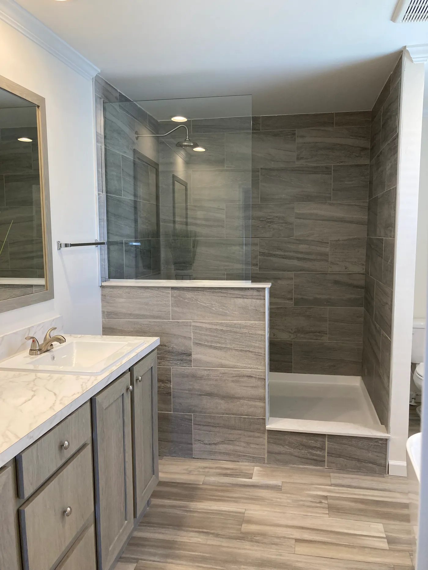 Master bath with soaker tub, double vanity and shower. 
