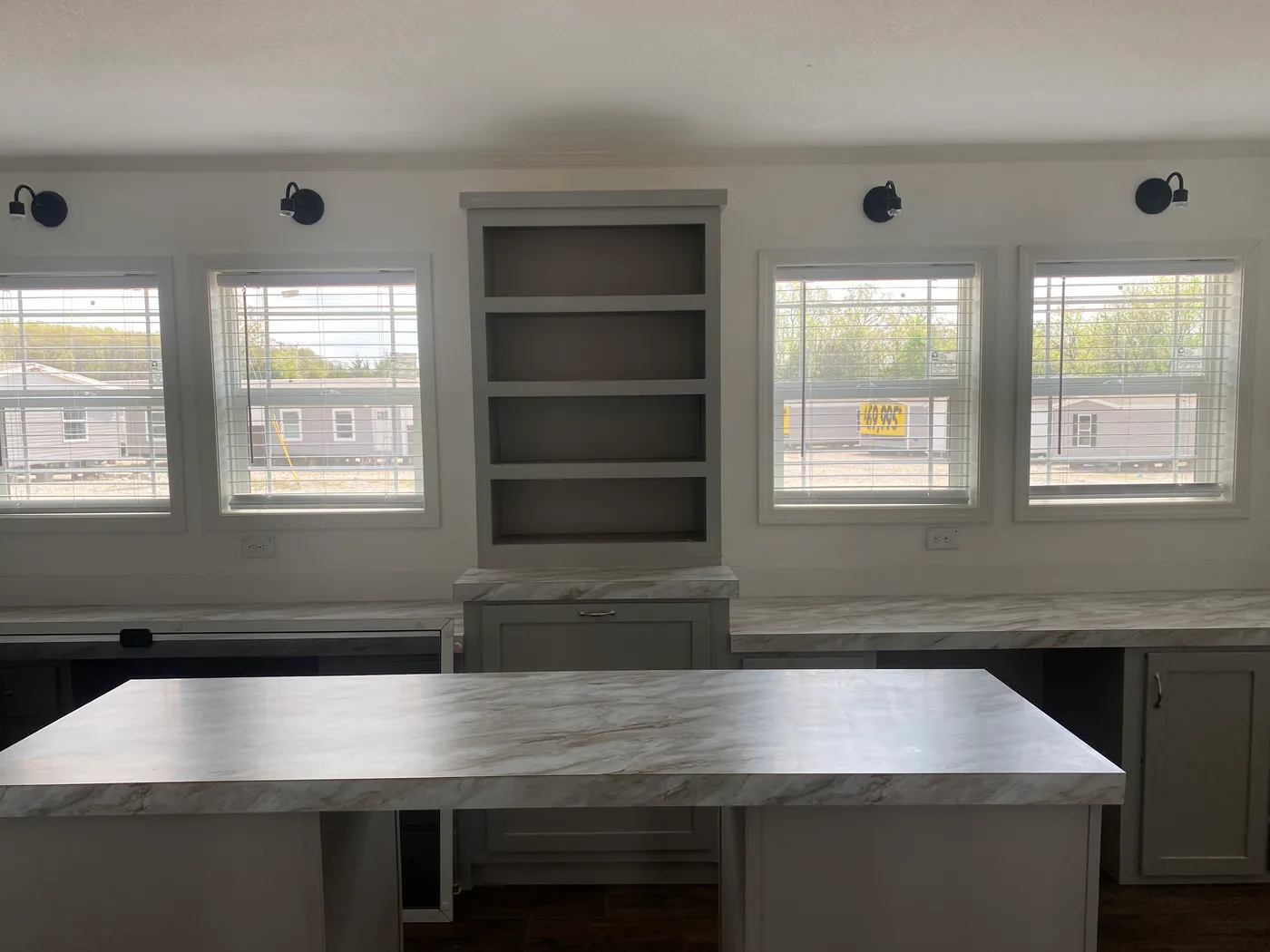 Laundry Room with an island. 